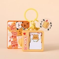 Butter Bear vintage mini TV keychain charm with flip card illustrations in cream yellow - Cream Yellow Flip-Book Bear