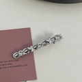 Silver hair clip with sparkling rhinestones and heart charms on a pink card - Silver/White Zirconia-Line Heart