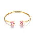 Minimalist gold cuff bracelet with square pink zircon stones in a sleek open design - Pink Square