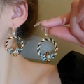 Close-up of model wearing gold tassel hoop earrings with colorful inlaid crystals - 41# Ear Hook - Colorful