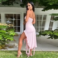 Pink strapless dress featuring ruched sides and asymmetric ruffle hem detail - S / Pink