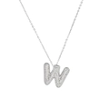 Macro shot of a silver letter W pendant with micro-pave cubic zirconia on a white background - Letter W
