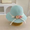 Detail of mint green straw sun hat featuring white lace ribbon and fabric floral accents - Single Hat-Lake Blue