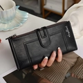 Women's long black bifold wallet with pebble leather texture and metal zipper - Black