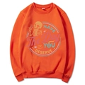 Orange crewneck sweatshirt featuring a retro skull print and Have The Day You Deserve text - Orange