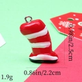 Macro shot of striped Christmas resin hat pendant with specific size and weight data - 8# Red and White Striped Tall Hat