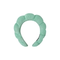 Close-up of light green sponge headband with soft wavy texture and high top design - Green