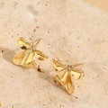Detail view of 14K gold plated flower earrings with sparkling zircon center on stone - Gold Flower Bow Rhinestone Stud Earrings / Gold