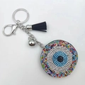 Blue evil eye rhinestone keychain with silver hardware and black tassel charm - Mixed White