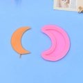 Pink silicone crescent moon cake mold with orange finished fondant shape on blue background - Moon With Handle Style (2)