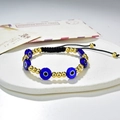 Dettaglio di perline malocchio in vetro blu e sfere dorate su bracciale intrecciato - Stile Occhio del Diavolo Blu Scuro (221025G-D-3)