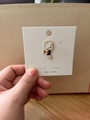 Cute cartoon boy enamel pin badge featuring white hair and heart, held in hand - 2*Little Boy Figure Pin