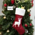 Red burlap Christmas stocking featuring white reindeer embroidery and plush faux fur trim - Full Reindeer