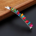 Detailed close-up of a silver hair pin featuring vibrant, natural colorful crystal stones - Colorful Shell with Silver Clip