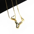Close-up of gold plated heart and letter Y pendant with colorful zircons on box chain - Pendant with Necklace / Letter Y
