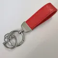 Red braided leather keychain with zinc alloy hardware and three functional key rings - Red (Silver Hardware)