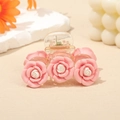 Sweet pink camellia hair claw clip with transparent base for elegant hairstyling - Pink