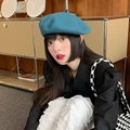 Teal wool beret hat for women styled with black jacket and plaid bag in a room - M (56-58cm) / Satomi Ishihara Blue-Green