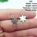 Macro view of a vintage silver snowflake alloy charm showing detailed product dimensions - 10# Snowflake Charm