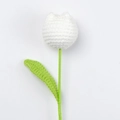 Handmade crochet white tulip flower with green stem and leaf on a clean white background - White
