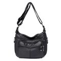 Retro black soft leather crossbody bag with multi-zipper compartments and adjustable strap - Black