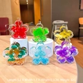 Star-shaped acrylic keychain with colorful dried flowers and glitter in six vibrant colors - 1 Piece / Luminous Dried Flower Style
