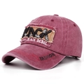 Close-up of distressed vintage baseball cap with Black Rebel embroidery and ripped details - Adjustable / Burgundy