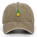Close-up of pineapple embroidery on khaki washed cotton vintage baseball cap - Khaki
