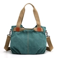 Blue canvas tote bag with khaki straps and orange leather trim details - Light Green