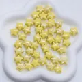 Handmade yellow ceramic star beads with glossy finish for DIY jewelry and necklaces - Light Yellow