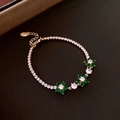 Tennis bracelet in gold finish with clear zircons and green emerald-style flower charms - 13# Zirconia Flower Square Bracelet (Green)