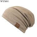 Soft beige cotton slouchy beanie featuring a premium brown leather logo patch - M (56-58cm) / Khaki
