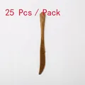 Set of 25 disposable golden plastic knives with elegant scalloped handle and serrated edge - Gold Disposable Knives