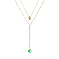 Détail du collier doré double épaisseur avec pendentif pierre verte et cercle irrégulier - Pierre Naturelle Vert Clair