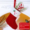 Red knit Christmas stocking with embroidered letter V and holly berries hanging on mantel - Letter V / Red