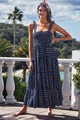 Détail des bretelles nouables et du bustier smocké sur la robe longue à étages - S / Robes / Bleu Marine à Pois