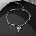 Pulsera de acero inoxidable plateado con colgante de corazón y eslabones alternados - Color Acero Corazón
