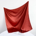 Detail showing the glossy red satin texture and soft drapes of the 90cm square scarf - 90*90cm / Caramel