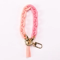 Porte-clés en résine dégradé rose à orange avec fermoir doré et pompon en cuir élégant - Rose et Rose Nude