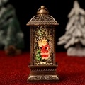 Primo piano di una lanterna di Babbo Natale rossa vintage con glitter e luce LED festiva - Babbo Natale in Casa