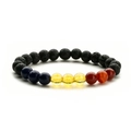 Close-up of tiger eye and lava stone elastic beaded bracelet showing porous texture - Lapis Lazuli + Red Agate + Citrine + Lava Stone