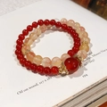 Detail of beaded bracelets with red agate and orange beads on a vintage book background - 25# Snowflake Agate Luck Crystal Bracelet - Gift Box
