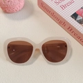 Close-up of beige heart sunglasses showing temple specs 56-18-144 on a warm aesthetic set - Pink 14-Beige Large Frame with Tea Lenses