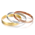 Polished 8mm stainless steel bangles in gold, silver, and rose gold stacked on white - Width 8mm Inner Diameter 60mm / [3 Rings] 1 Gold + 1 Steel + 1 Rose Gold