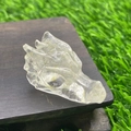 Carved 1.5 inch clear quartz dragon head figurine with natural crystal inclusions - White Crystal