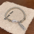 Bracciale di perle argento con perla barocca e piastrina su carta artistica - Argento (Perla Barocca)
