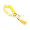 Detail view of yellow gradient acrylic chain keychain with golden hardware and tassel - Yellow(3#)