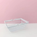 Close-up of a white metal mesh storage basket with dual handles for desktop organization - White Small Basket 15*10.5*6cm