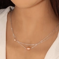 Silver double-layer necklace with pink oval freshwater pearls shown on model - Silver Double Layer with Two Pearls