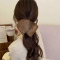 Retro deep brown pleated leather bow hair tie worn on a low ponytail for women - Dark Brown Leather Pleated Bow / Coffee (Scrunchie-Coffee)